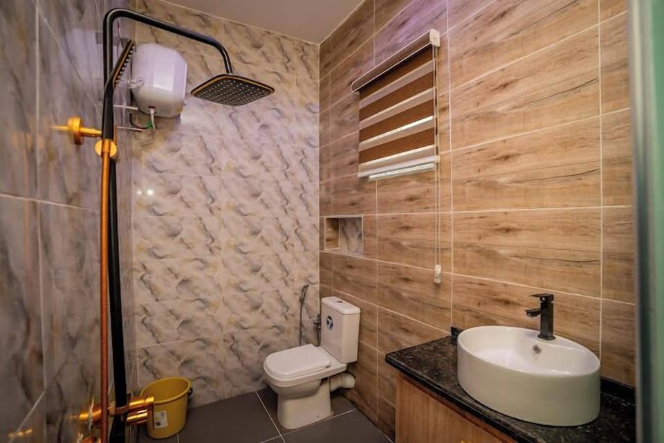 Family Room, Balcony, City View | Bathroom | Free toiletries, hair dryer, towels, soap