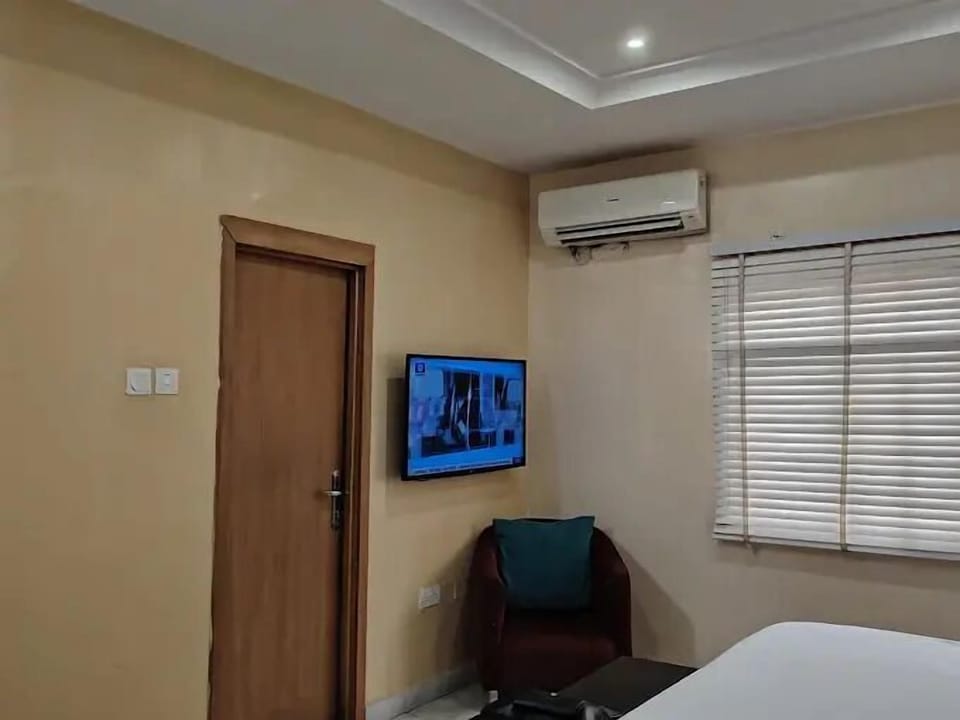 Family Room, Balcony, City View | Desk, laptop workspace, blackout drapes, soundproofing