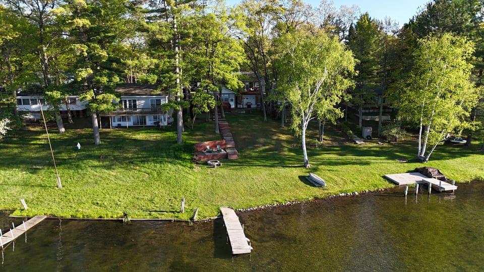 OVERALL:  Aerial view of the dock and backyard
