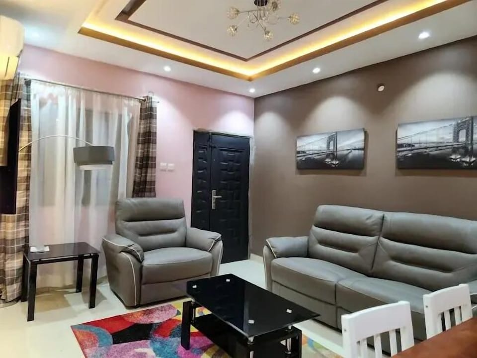Deluxe Room, Balcony, City View | Living area