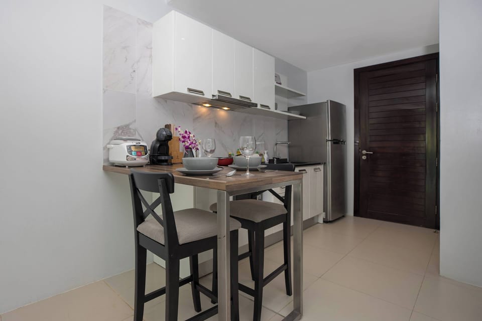 Exclusive Apartment, Balcony, Pool View | In-room dining