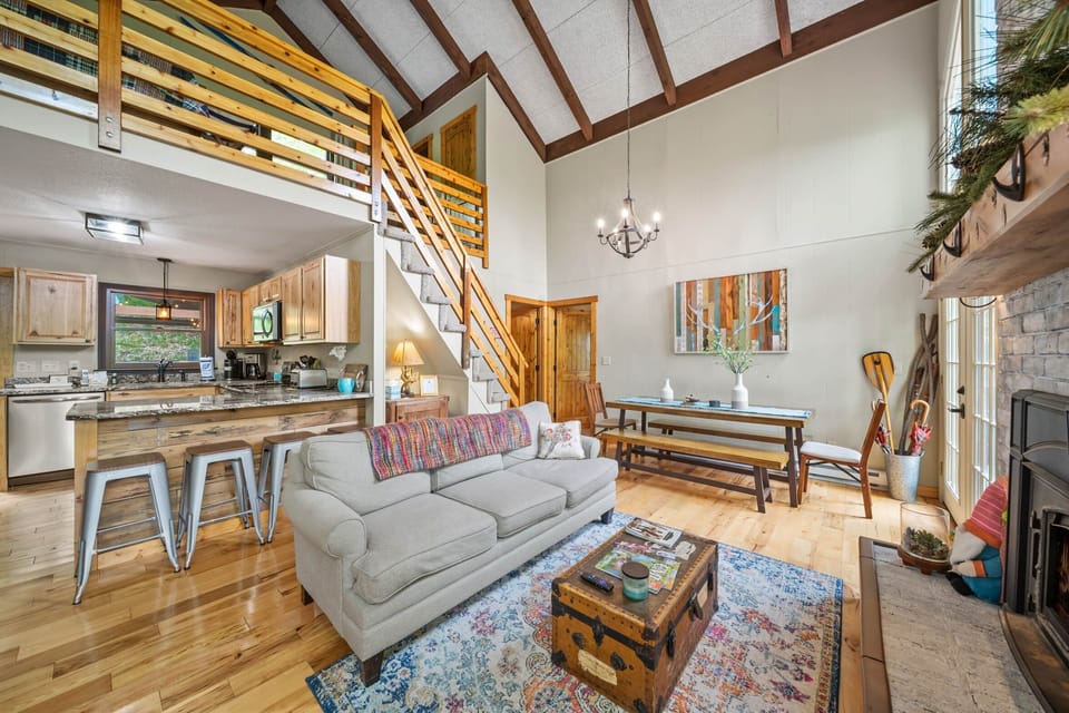 Living Room Kitchen and Dining with Loft Above