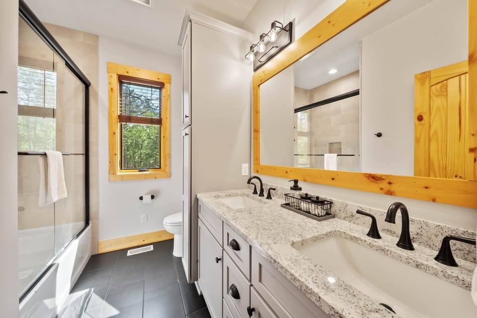 Tub and Shower Combo with Dual Sink Vanity in the Queen Ensuite