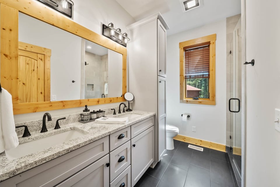 Master Bathroom with Custom Tiled Shower and Dual Sink Vanity