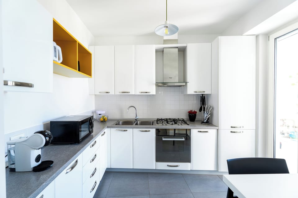 Design Apartment, 2 Bedrooms, Sea View | Private kitchen | Espresso maker, coffee/tea maker, electric kettle