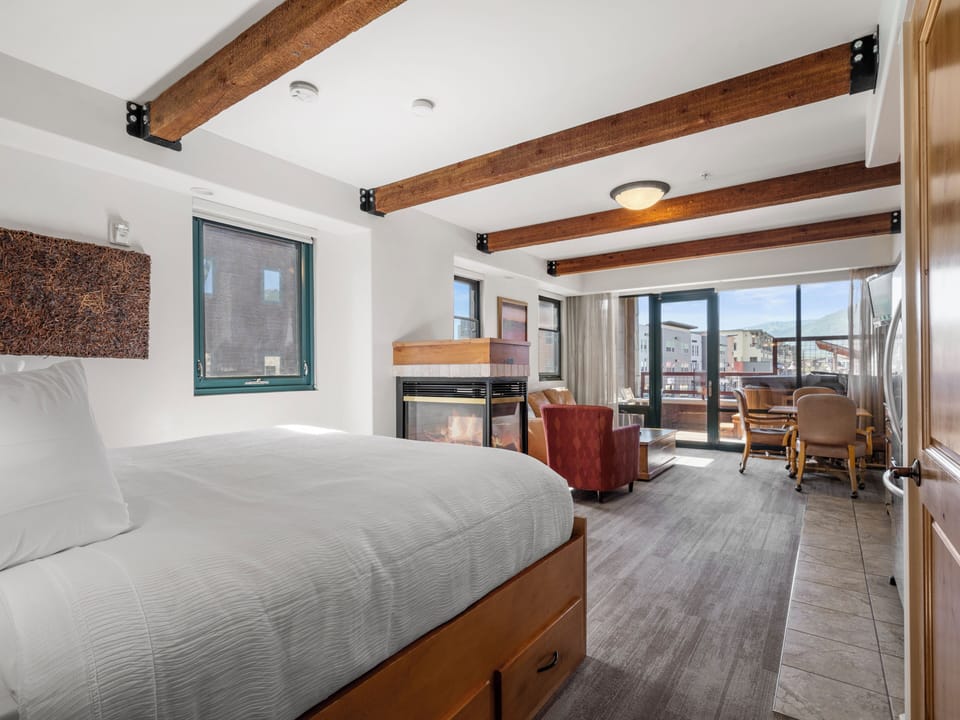 King Bed / Kitchen / Dining / Balcony