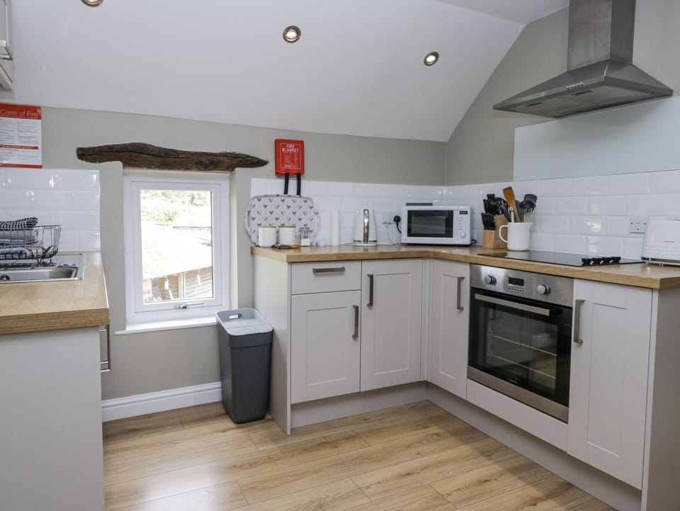 Fridge, microwave, toaster, cookware/dishes/utensils