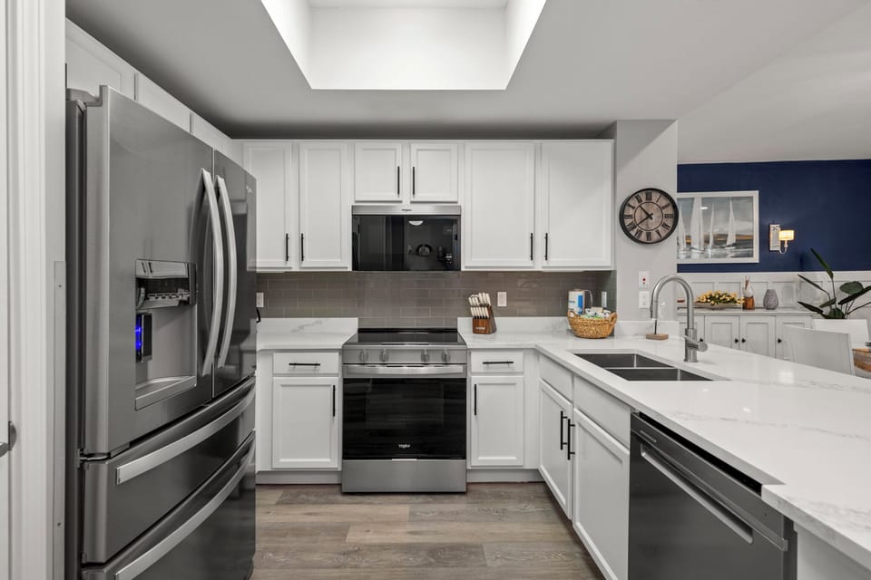 Plenty of room for the Chef of the family in this fully stocked Kitchen.