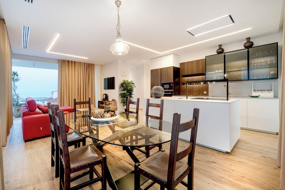 Luxury Suite, Sea View | Living area | TV