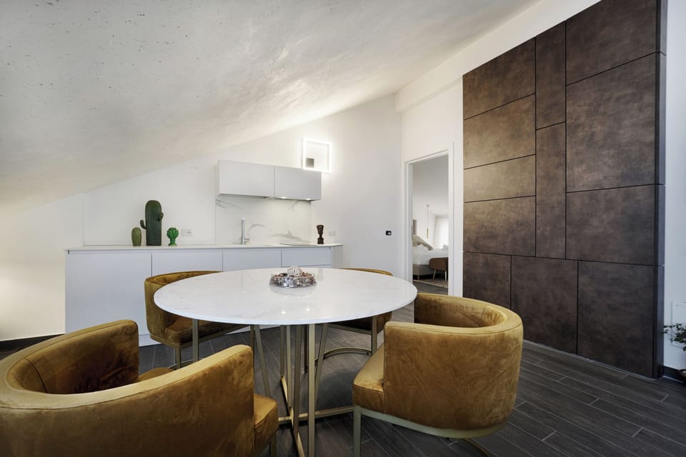 Luxury Suite, Balcony | Living area | TV