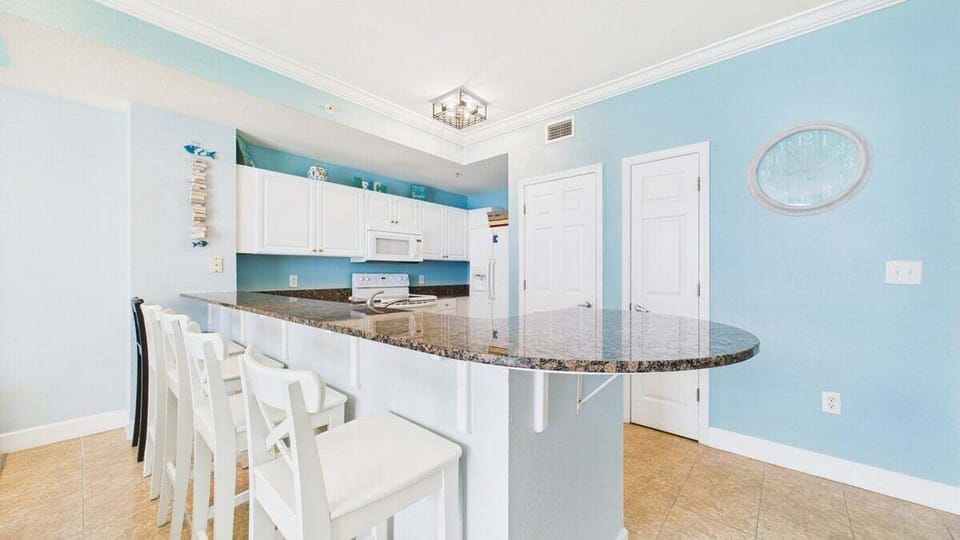 Breakfast bar attached to kitchen
