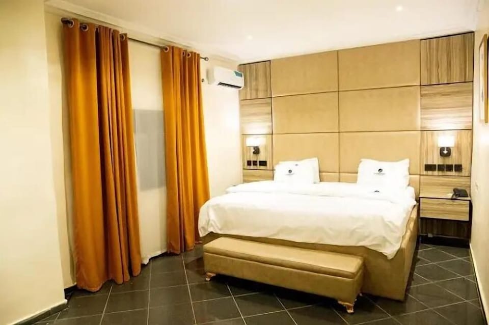 Economy Room, Balcony, City View | Desk, laptop workspace, blackout drapes, soundproofing