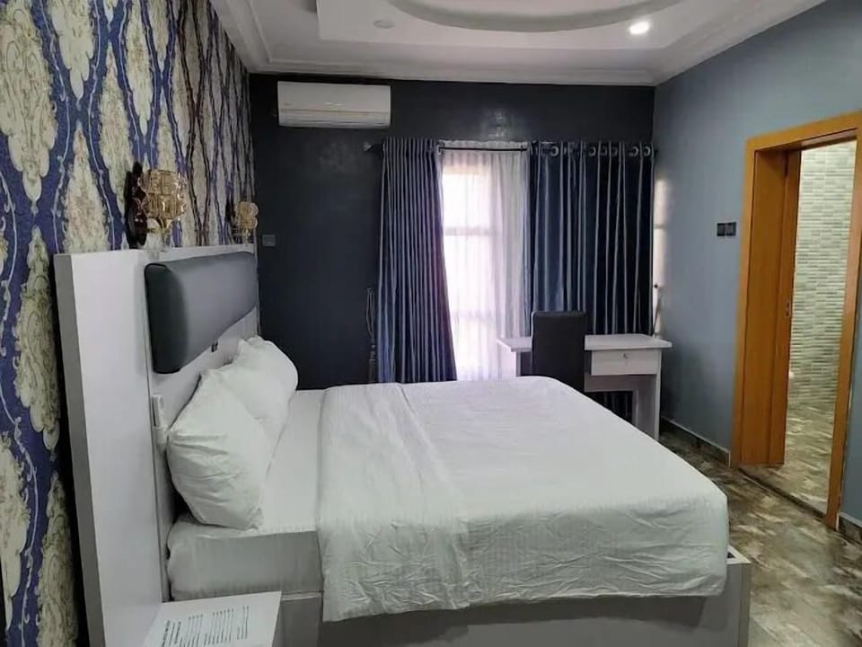 Economy Room, Balcony, City View | Desk, laptop workspace, blackout drapes, soundproofing