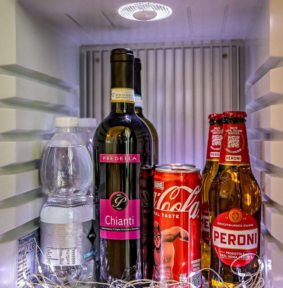 Family Suite, Balcony, City View | In-room safe, desk, laptop workspace, soundproofing