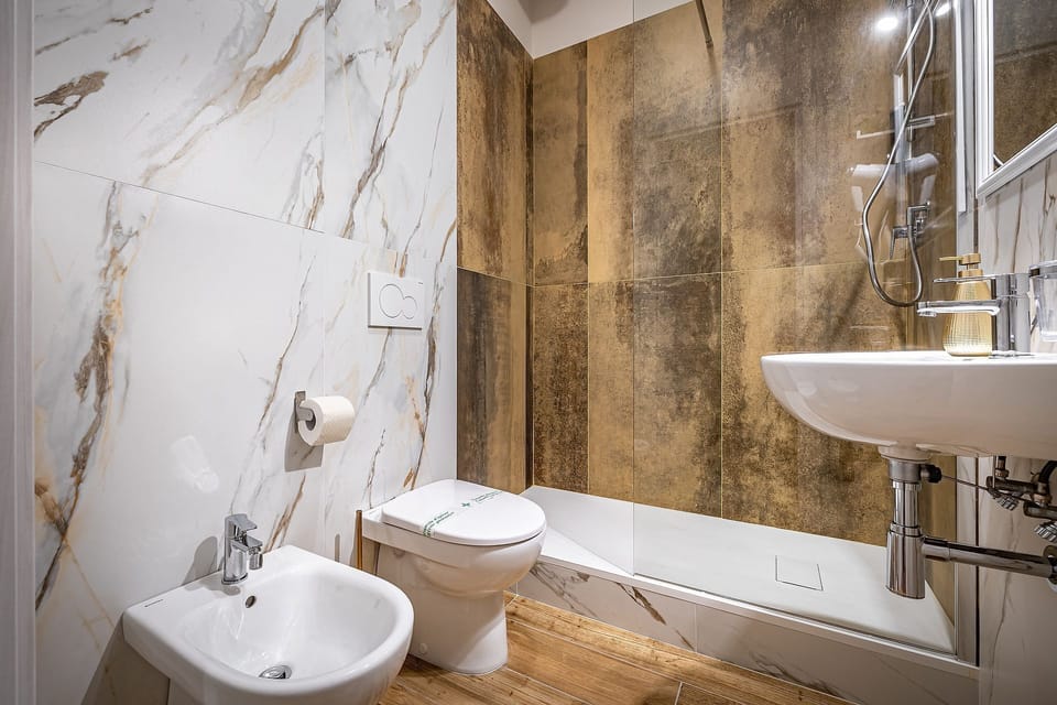 Deluxe Double or Twin Room, City View | Bathroom | Shower, hair dryer, bathrobes, bidet