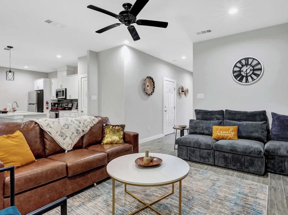 Living Room: Bright space with stylish seating and modern decor, perfect for relaxing together!