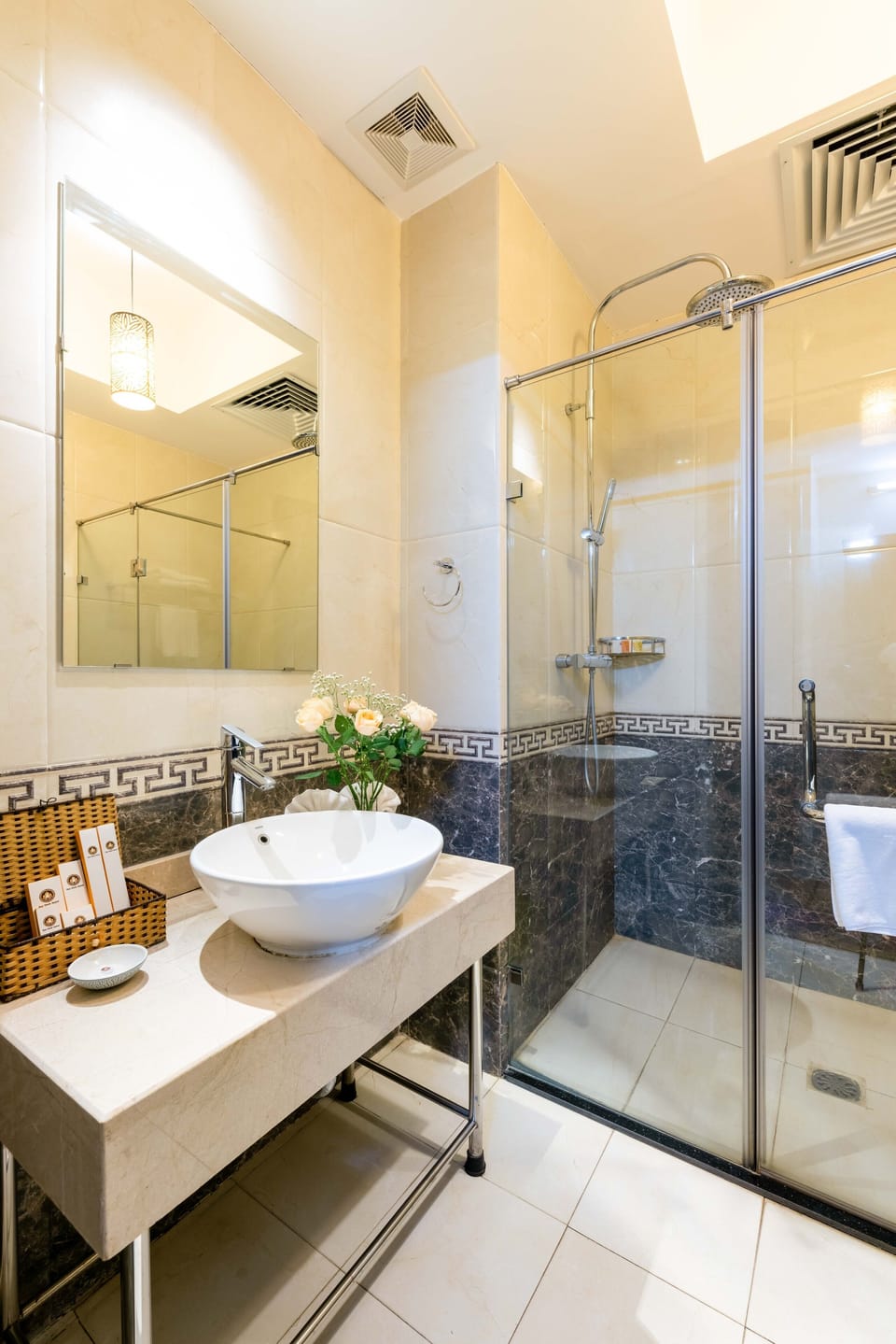Shower, free toiletries, hair dryer, slippers