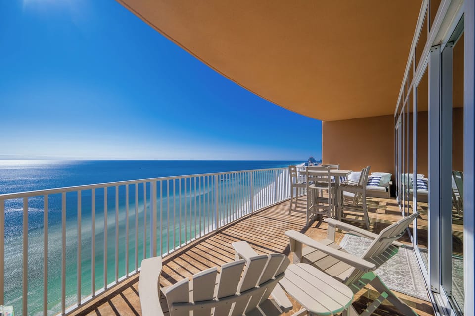 Bask in the sun as you enjoy expansive panoramic coastal views from your balcony retreat