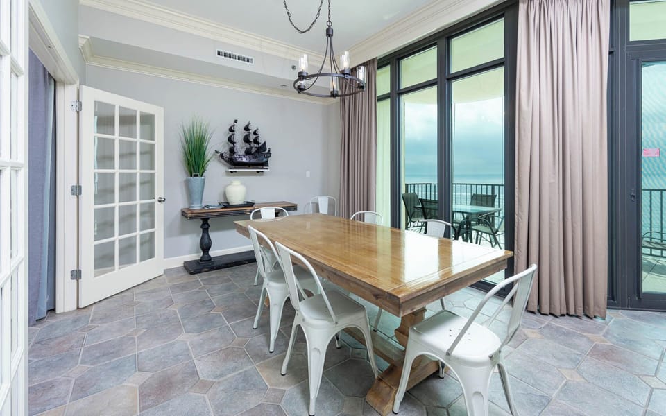 Gather around the rustic dining table and enjoy uplifting coastal views while connecting with loved ones