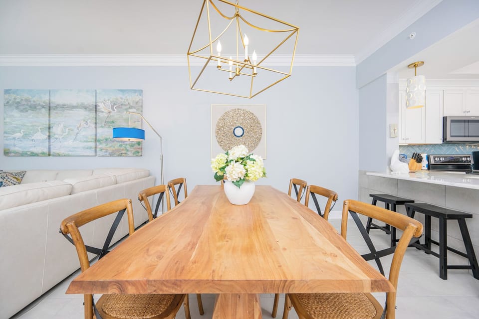 Gather around the elegant wooden dining table, perfect for sharing meals and enjoying quality time together