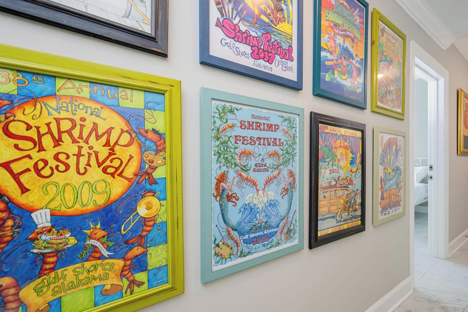 Admire the vibrant artwork celebrating local festivals, adding a lively touch to the hallway's inviting atmosphere