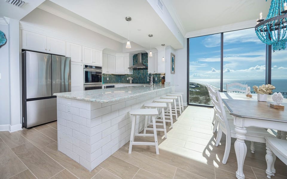 Gather for family meals or enjoy a fun game night with stunning panoramic coastline views