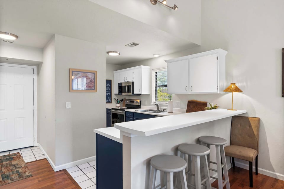 Condo, Multiple Beds, Balcony, Garden View (The Joyful Getaway) | Private kitchen | Coffee/tea maker, fridge, microwave, oven