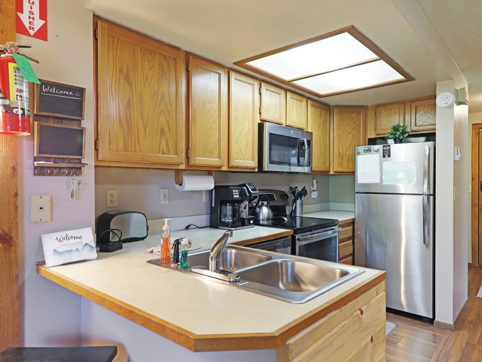 Fully loaded kitchen with stainless steel appliances