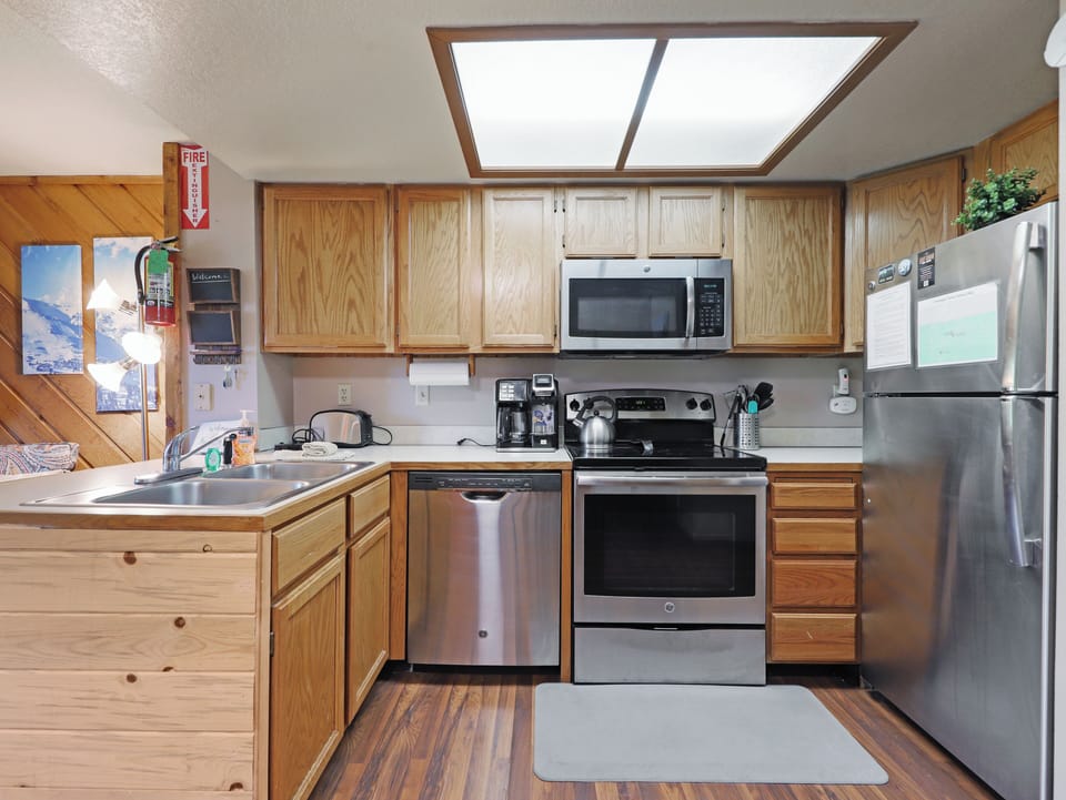 Fully loaded kitchen with stainless steel appliances