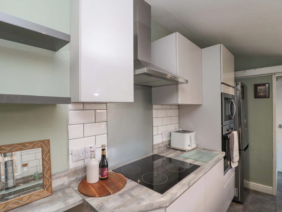 Fridge, microwave, toaster, cookware/dishes/utensils