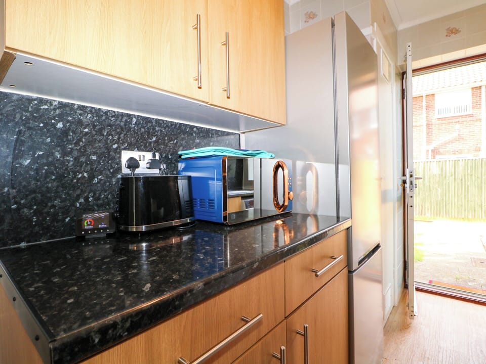Fridge, dishwasher, toaster, cookware/dishes/utensils