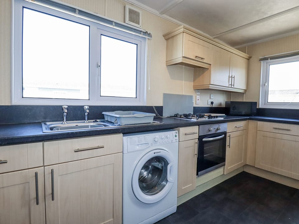 Fridge, toaster, cookware/dishes/utensils