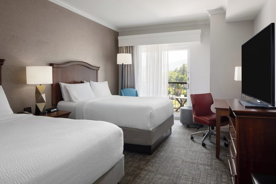 Suite, 1 Bedroom | In-room safe, desk, blackout drapes, iron/ironing board