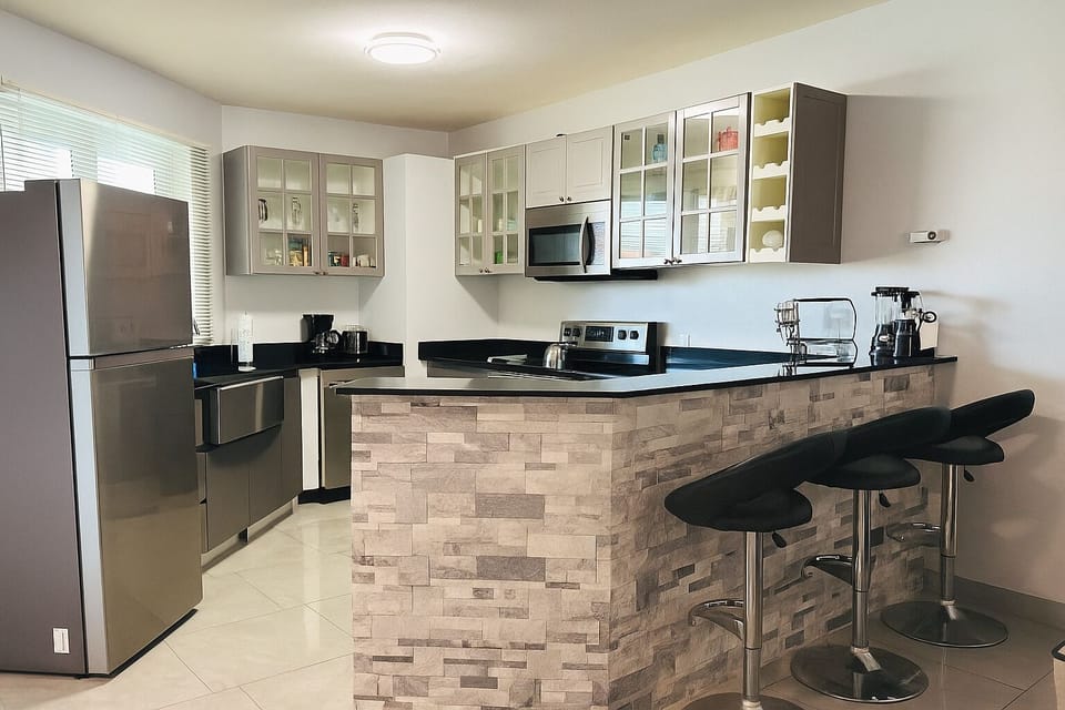 Kitchen with modern stainless steel appliances for your culinary masterpieces