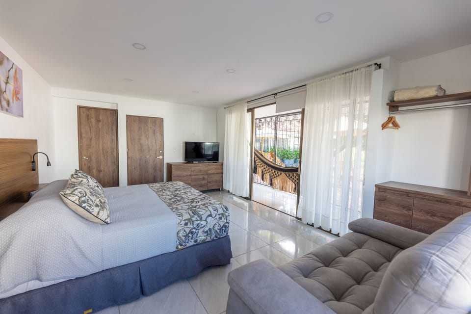 Deluxe Double Room, 1 King Bed with Sofa bed, Balcony, Pool View | Premium bedding, minibar, desk, free WiFi
