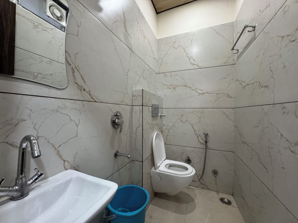 Comfort Room | Bathroom | Shower, slippers, towels, soap
