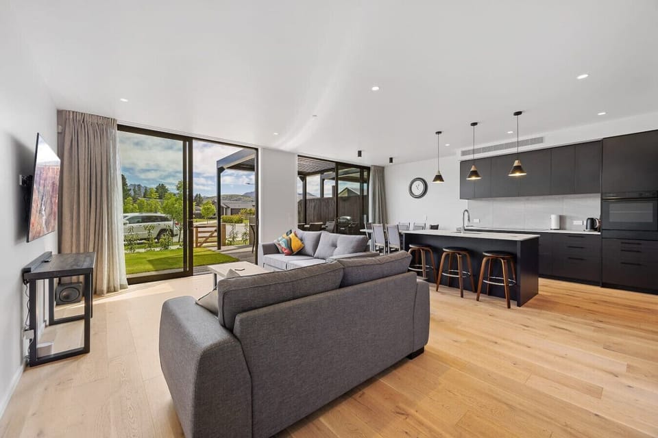 The open plan living area receives plenty of natural light