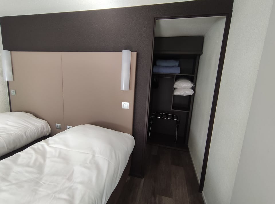 Standard Room, 2 Twin Beds | Desk, blackout drapes, soundproofing, iron/ironing board