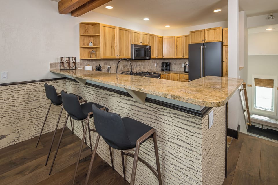 Bar seating for three people | Main Level