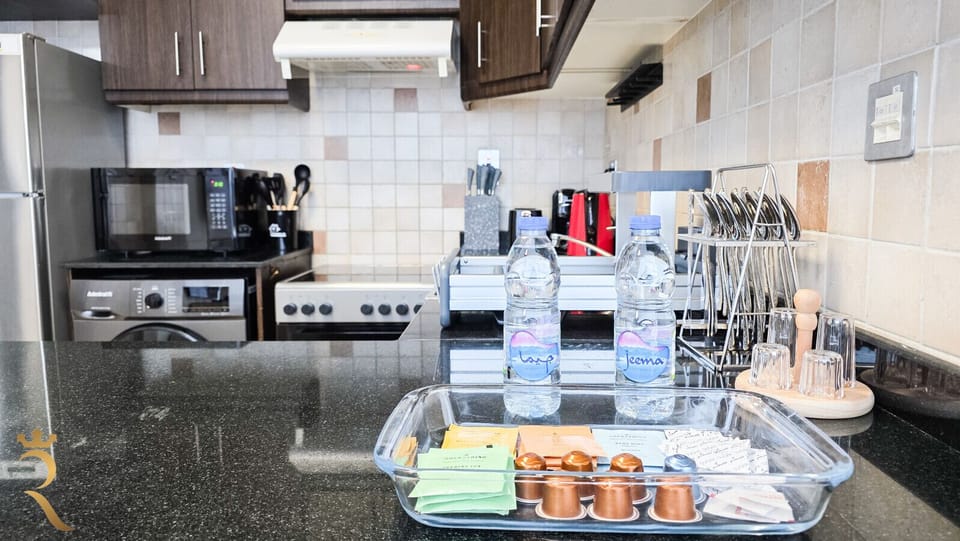 Enjoy the convenience of a fully equipped kitchen, perfect for everything from quick breakfasts to home-cooked dinners.