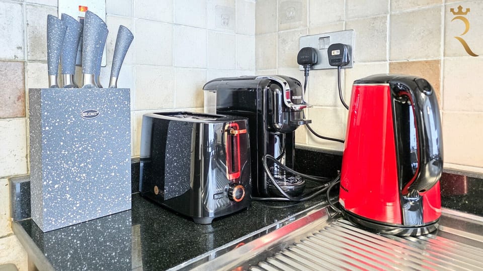 Designed for convenience and comfort, our kitchen includes modern appliances, cookware, and everyday essentials.