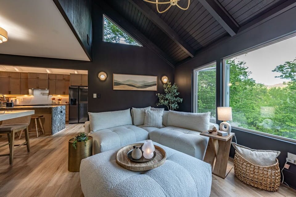 Enjoy the open floor plan where just a few steps from the cozy living room you’ll find the fully equipped kitchen — perfect for whipping up snacks, sharing meals, and staying connected while everyone relaxes. 