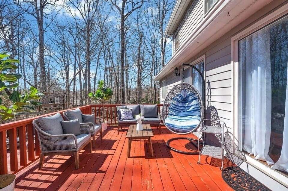 Bask in the sunshine on this spacious outdoor patio beside the deck—perfect for dining, relaxing, and soaking up the day.