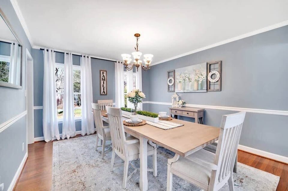 Enjoy delicious meals and good company in the cozy dining area designed for comfort and style.