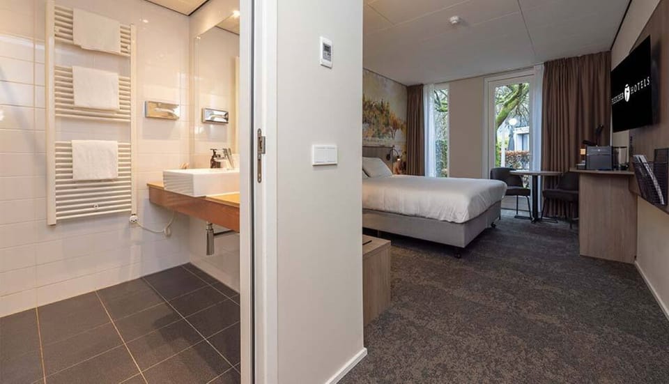 Step easily from sleep to a bright, spa-clean wash area.