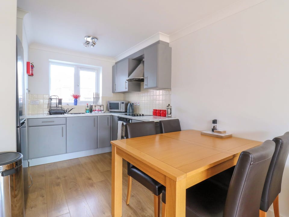 Fridge, microwave, toaster, cookware/dishes/utensils