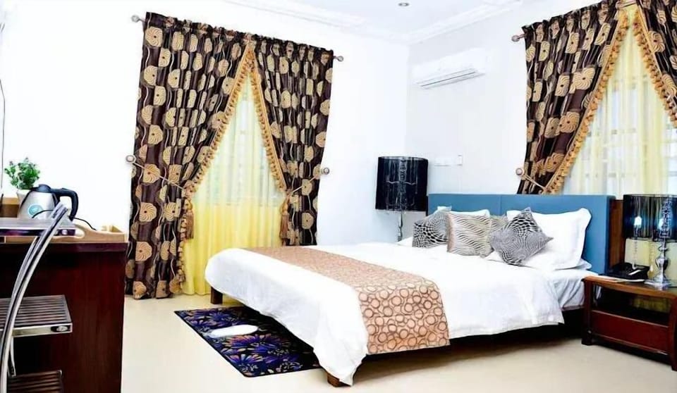 Economy Room, Balcony, City View | Desk, laptop workspace, blackout drapes, soundproofing