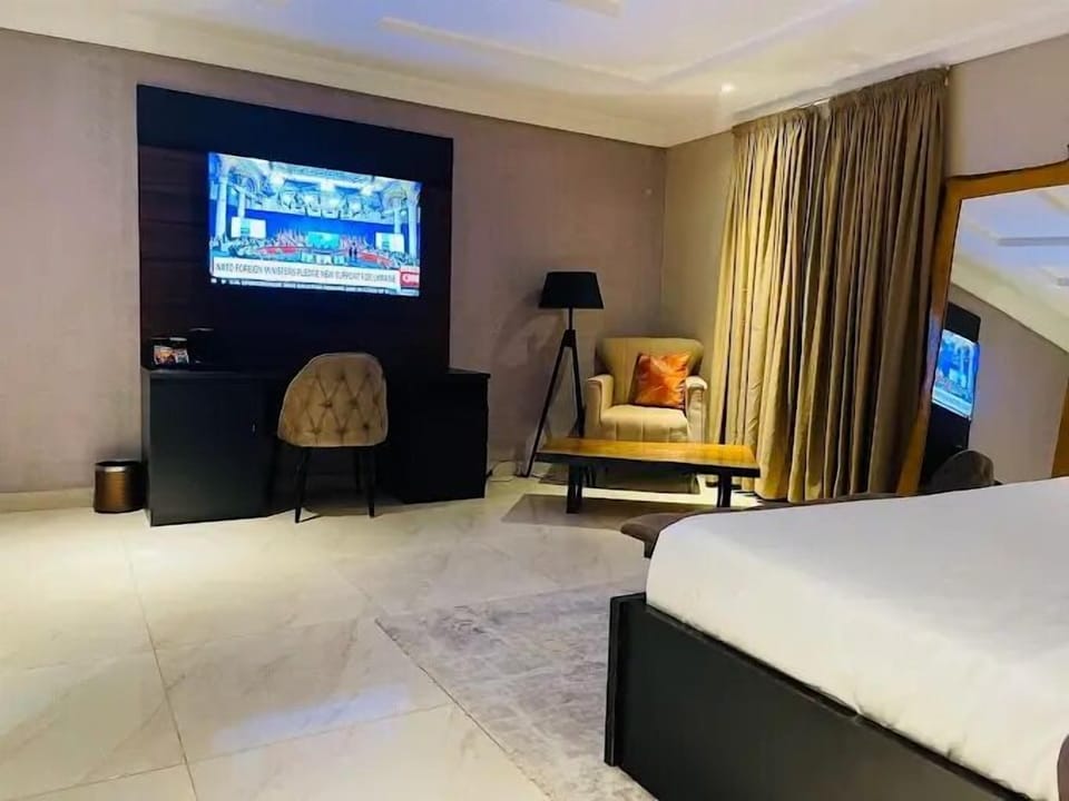 Family Room, Balcony, City View | Desk, laptop workspace, blackout drapes, soundproofing