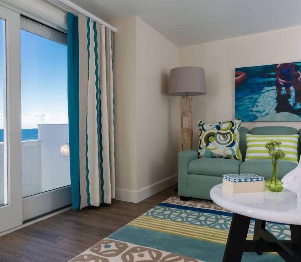 Ocean Suite with Balcony | Living area | TV, fireplace, tablet, iPod dock