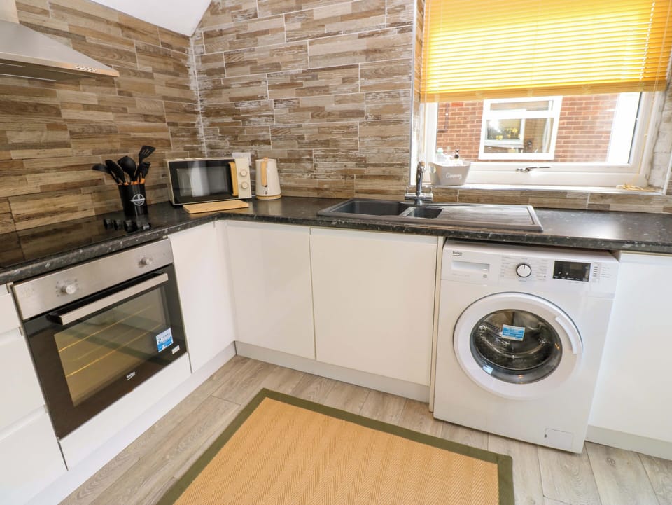 Fridge, microwave, toaster, cookware/dishes/utensils